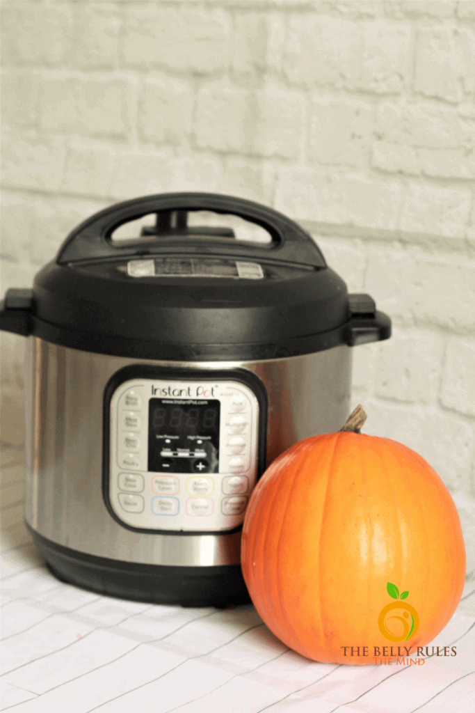 sugar pumpkin next to an instant pot